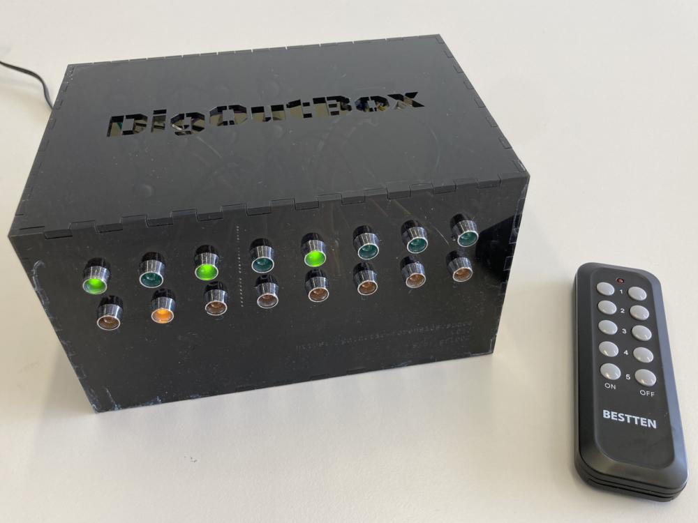 Image of the DigOutBox with remote control